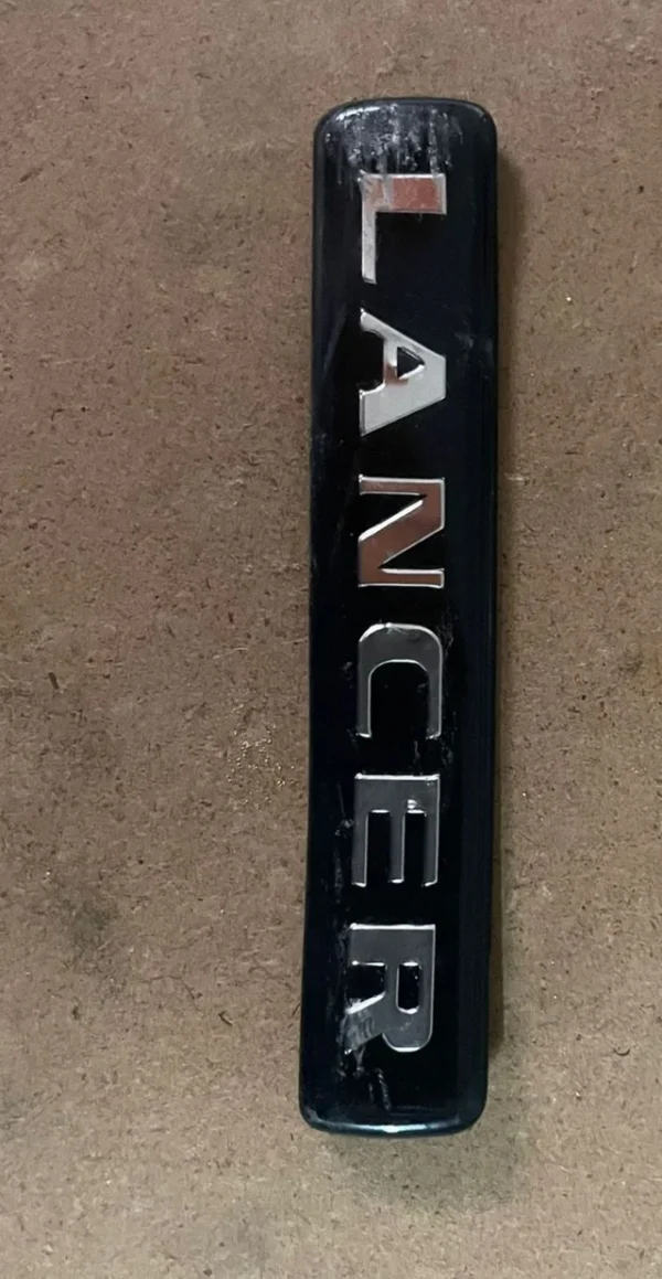 Mitsubishi lancer evo 7 emblema porton descatalogado